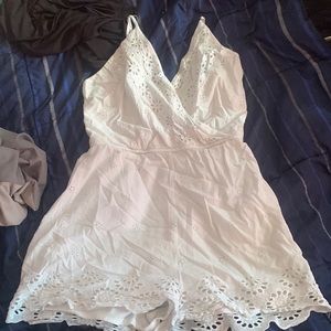White romper only worn once I need to get out of my closet